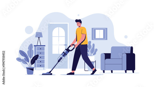 Responsible young man using modern vacuum cleaner to tidy blue living room with soft furniture and potted plants.