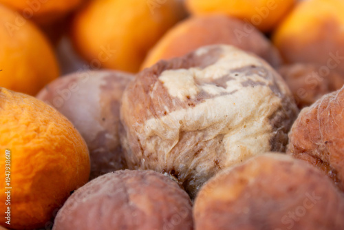 Fotografija Rotten Moldy Apricots Close Up, Spoiled Organic Fruit Decay, Food Waste and Fung