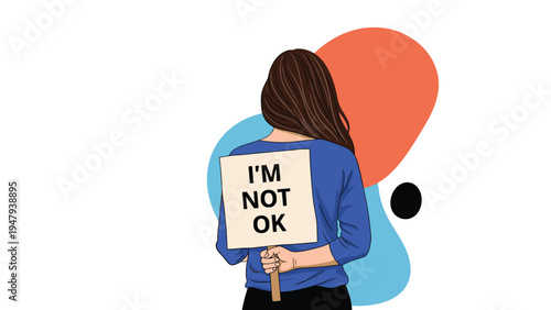 Woman seen from behind holds up a sign that says I am not okay against a backdrop of colorful abstract shapes.