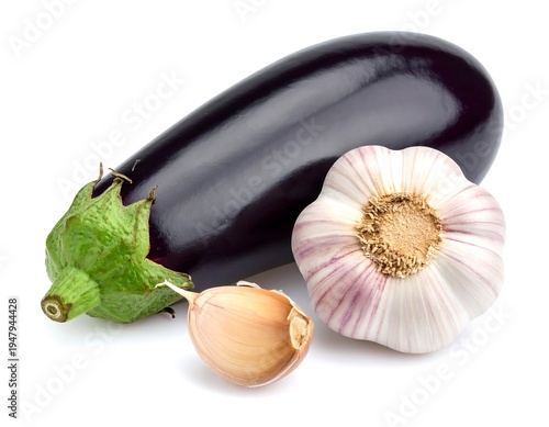 Glossy eggplant with fresh garlic bulb & single clove, all close up on a pure white background