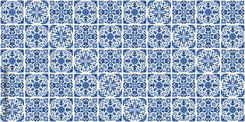 Blue and white azulejo tile pattern with ornamental geometric and floral motifs. Traditional Portuguese ceramic mosaic background inspired by vintage Mediterranean wall tiles and classic decor.