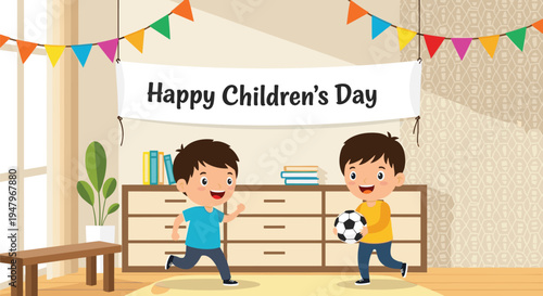 Two happy young boys celebrate Childrens Day by playing with a soccer ball in a decorated living room with a banner.