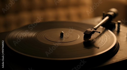 Warm toned vintage record player spinning a vinyl record creating a nostalgic feeling