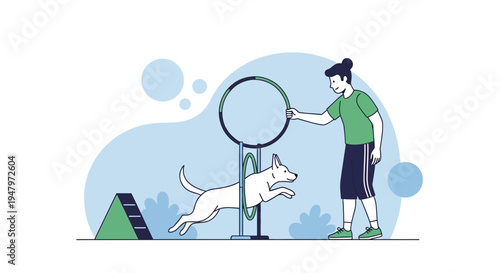 Dog agility training: dog jumps through hoop with owner on obstacle course