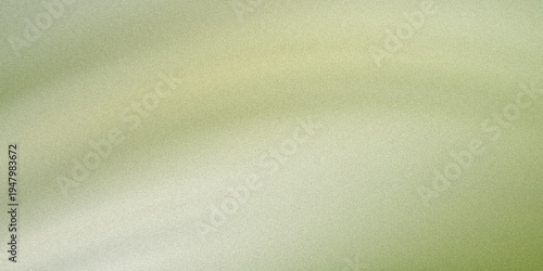 a close-up of a green and white background with a yellow spot