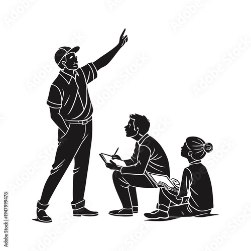 Sports coach instructing two young athletes on a sports field during a practice session focused on teamwork and skill development