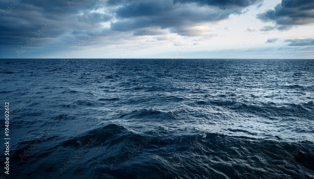 Fototapeta premium Overcast Day Open Ocean On The Horizon Calm Rippling Wavy Water Surface