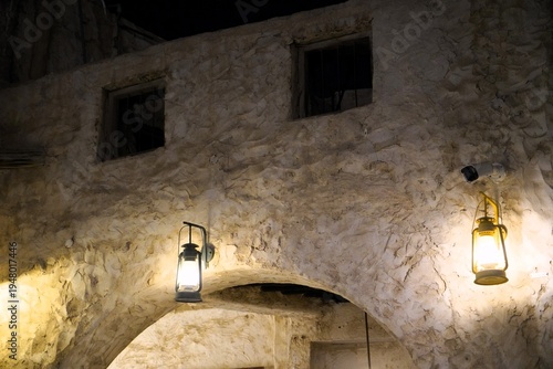 view on ancient Arabic wall with lamps