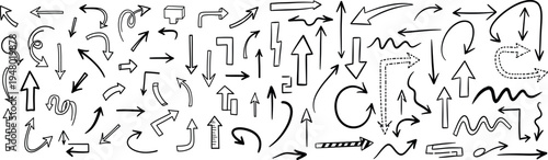 A complex arrangement of arrows and letters in a chaotic composition