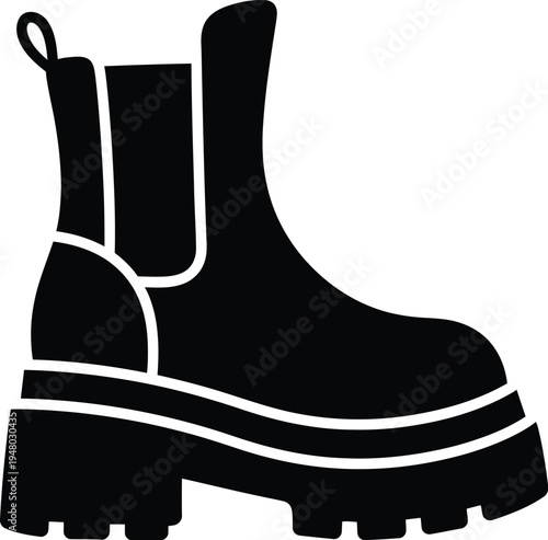 A black silhouette of a modern chelsea boot with a thick lug sole for winter and autumn fashion