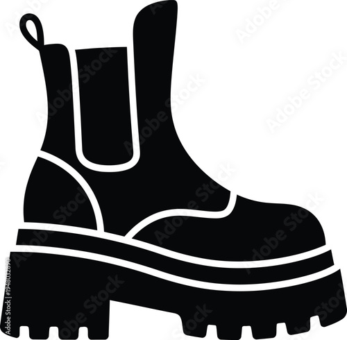 A black silhouette of a stylish chelsea boot with a thick chunky platform sole for modern fashion