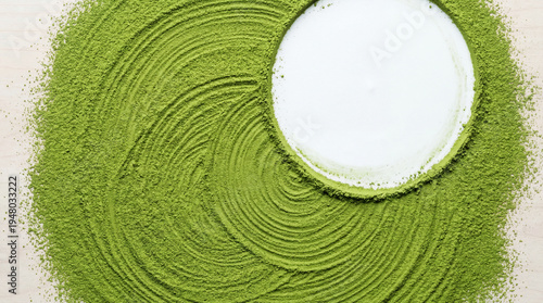 A vibrant green matcha powder design on a white background with a circular pattern
