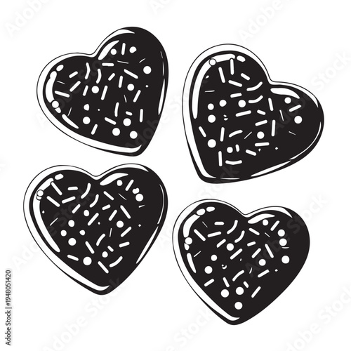 Three chocolate heart shaped cookies, deliciously formed and decorated with sprinkles on a white background.
