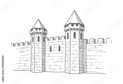 Medieval stone castle wall with two conical towers and crenellations