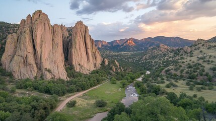 Papier peint photo Pantone 2025 Mocha Mousse Sunset aerial view of canyon, river, and mountains  © Agus