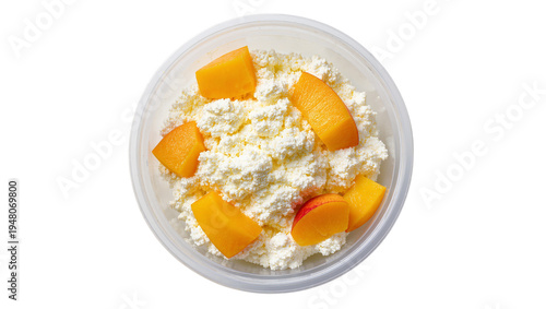 Cuadro en lienzo Isolated bowl of fresh cottage cheese with sweet juicy peach slices for a health