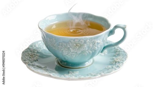 Tableau sur toile Isolated elegant light blue teacup with saucer filled with steaming hot herbal t
