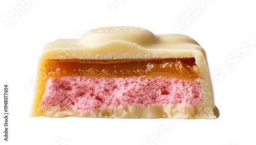 Isolated delicious cut white chocolate candy bar with gooey caramel and a vibrant pink filling.