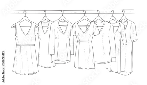 Line of assorted v-neck dresses and tops hangers fashion clothing