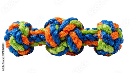 Photos Isolated vibrant colorful knotted rope dog toy, durable pet chew toy for playing