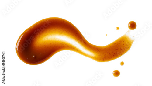 Photos Isolated caramel sauce swirl with drops, sweet dessert topping, delicious golden
