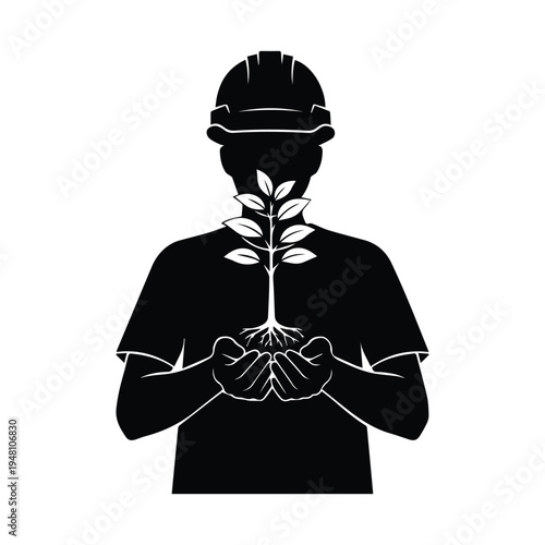 Construction worker nurturing a young plant symbolizing growth and sustainability