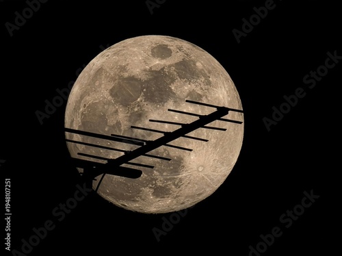 Full Moon with Rooftop Aerial Silhouette