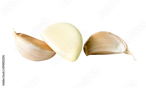 Side view set of three garlic cloves in heap isolated with clipping path in png file format