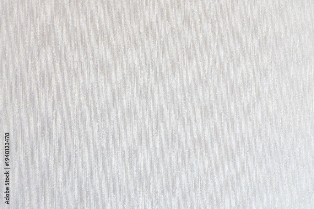 Fototapeta premium Textured white background with subtle vertical lines, suitable for various design applications, including presentations, websites, and print materials