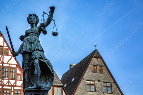 Lady Justice Statue in Roemerberg Square Frankfurt Germany