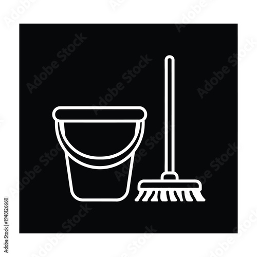 Minimalist cleaning tools set featuring bucket and broom for modern home organization