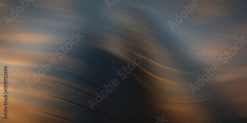 Obraz na plátne Abstract background featuring flowing golden waves against a dark textured blue