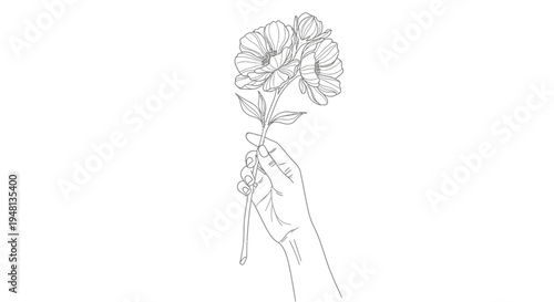 Hand holding a single flower bouquet.