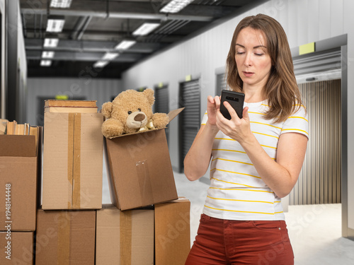 Self storage rental. Woman ...
