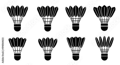 Set of eight black badminton shuttlecocks silhouettes on a white background