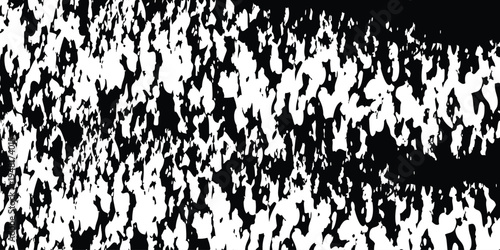 A black and white abstract image with a textured pattern of irregular shapes and pixels
