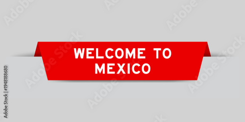 Red color inserted label with word welcome to mexico on gray background