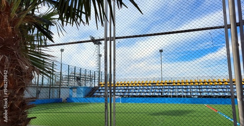 A large football stadium with open stands