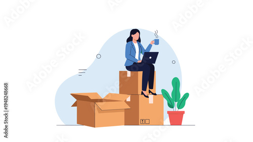 Professional woman sitting on a stack of moving boxes while working on her laptop and drinking coffee in a new office space.