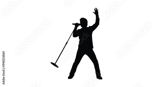 Silhouette of a man singing into a microphone with one hand raised