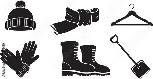 Black and white of winter clothing and shovel scarf gloves