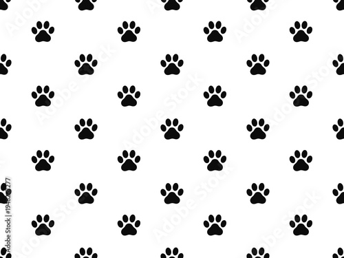 Cute hand drawn animal footprint silhouette repeating pattern for pet themed textile design
