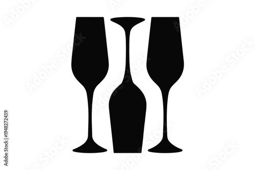 Black silhouette of a champagne bottle between two champagne flutes on white glasses celebration