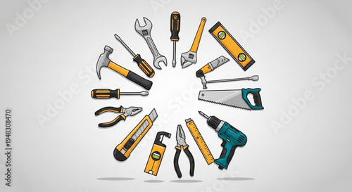 Collection of various yellow and silver hand tools arranged in a circle on a gray background for diy and construction projects