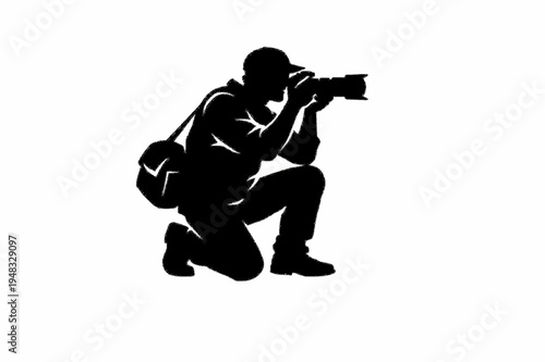 Professional Photographer Silhouette Kneeling with Digital Camera and Gear Bag