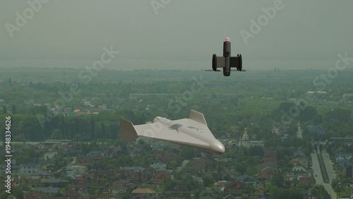 Fotografie An interceptor drone and a combat drone against a city backdrop, on the topic of