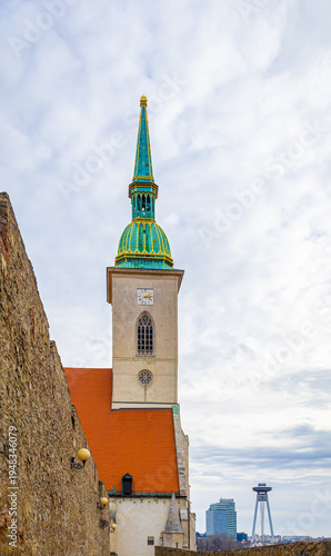 Photography St Martins Cathedral Bratislava with castle wall and tower vertical view