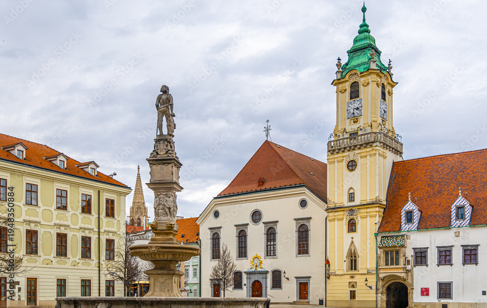 Obraz premium Michaels Gate Bratislava Old Town street view with pedestrians and tower