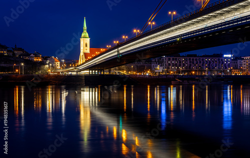 Photography Bratislava night skyline with St Martins Cathedral bridge and reflections
