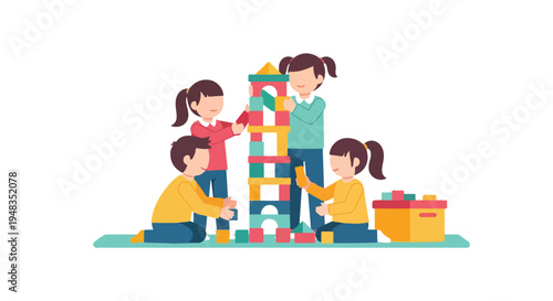 Four children are happily playing together on a mat, cooperatively building a tall, colorful tower out of toy blocks.